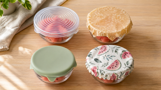 4 reusable food wrap types silicone stretch lids beeswax fabric covers flat lay
